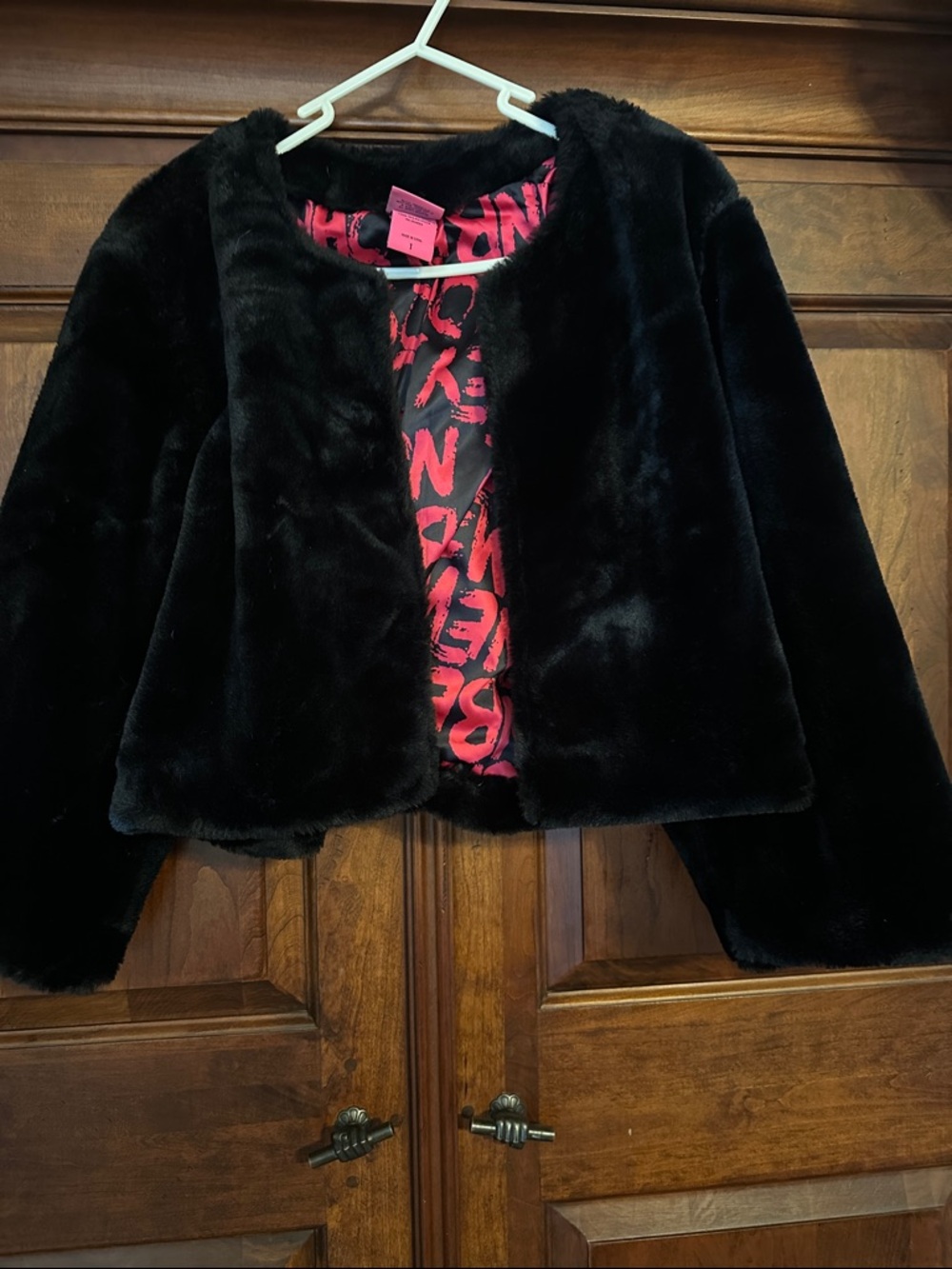 torrid Black Faux Fur Cropped Jacket with Pink Printed Lining